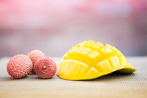 categories of fruits - lychee and mango