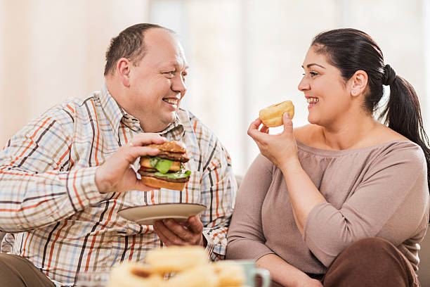 eating unhealthy food together.