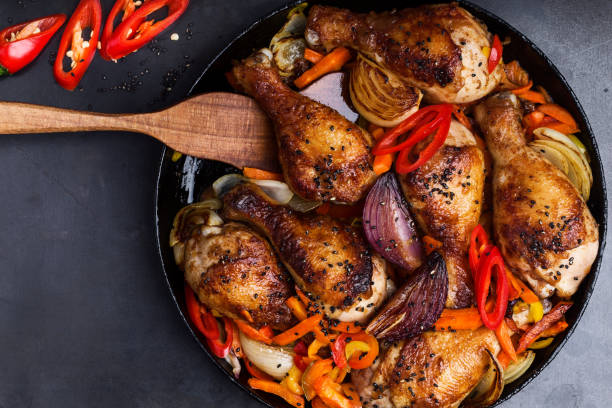 Spicy roasted chile miso  chicken drumsticks  with bell pepper and onion